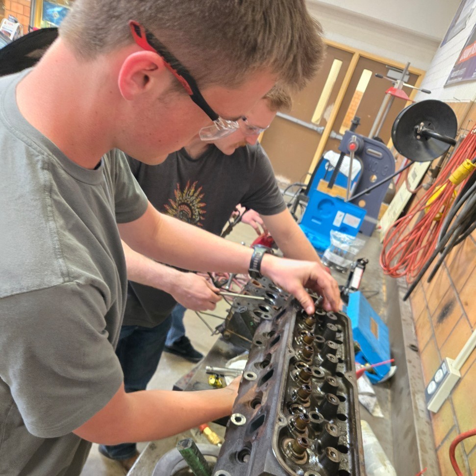 students working on engines