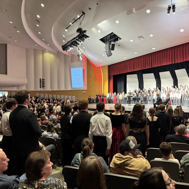 choir singing on stage and aisles