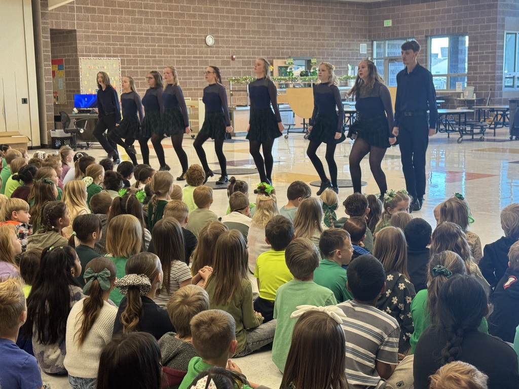 dancers performing for student assembly