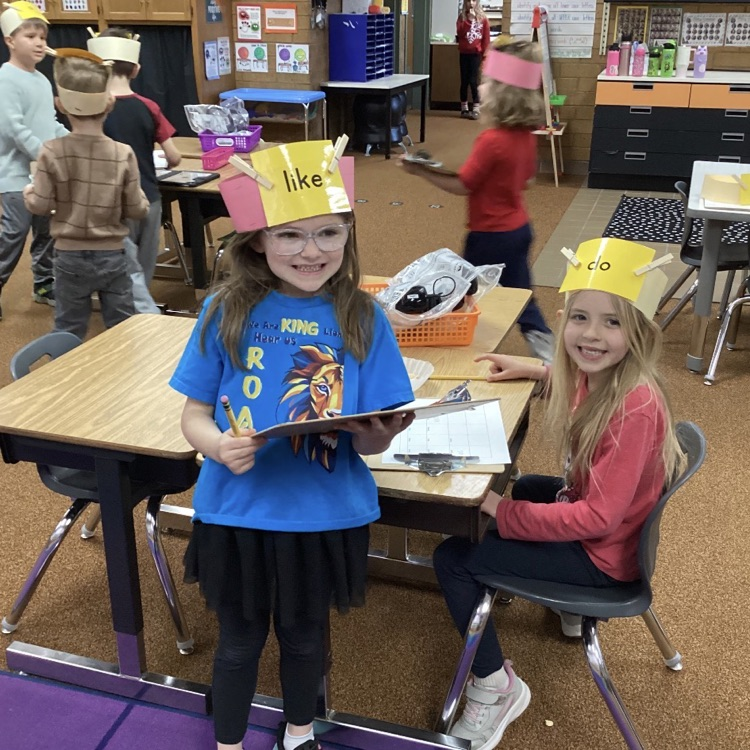 We are practicing reading and writing our tricky words by playing the headband game! 