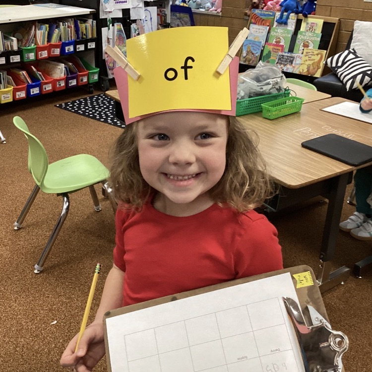 We are practicing reading and writing our tricky words by playing the headband game! 