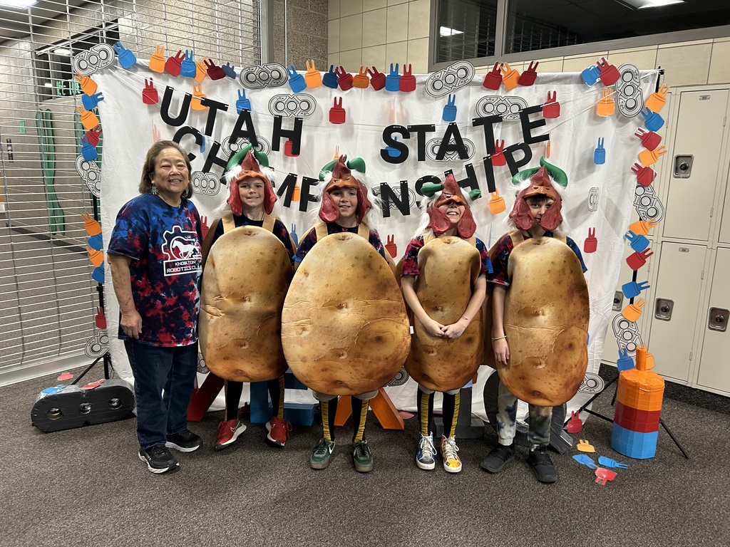 Robotics team with coach