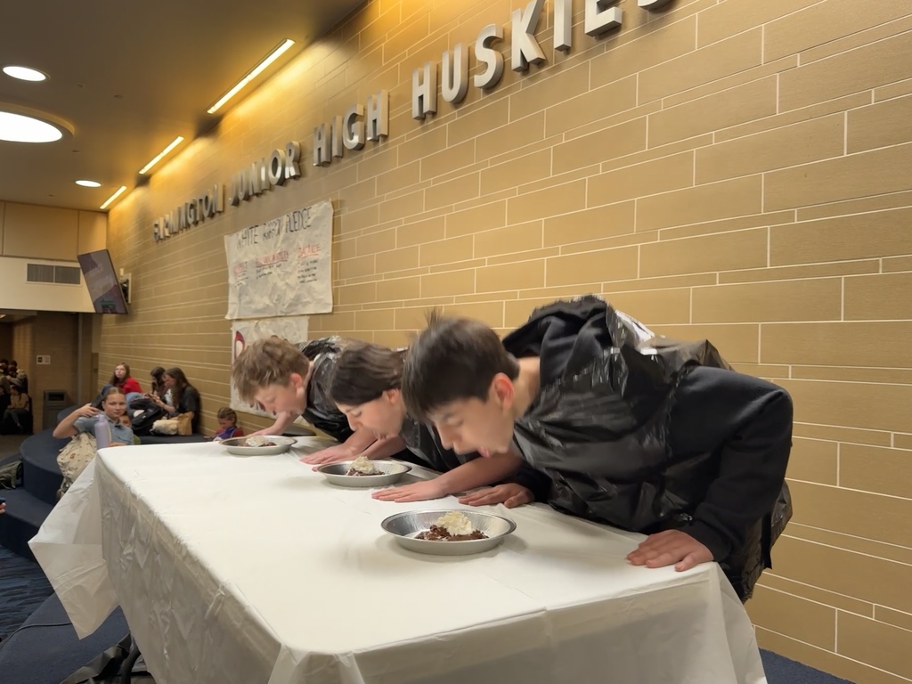 Students getting ready for the pie eating contest in second lunch. 