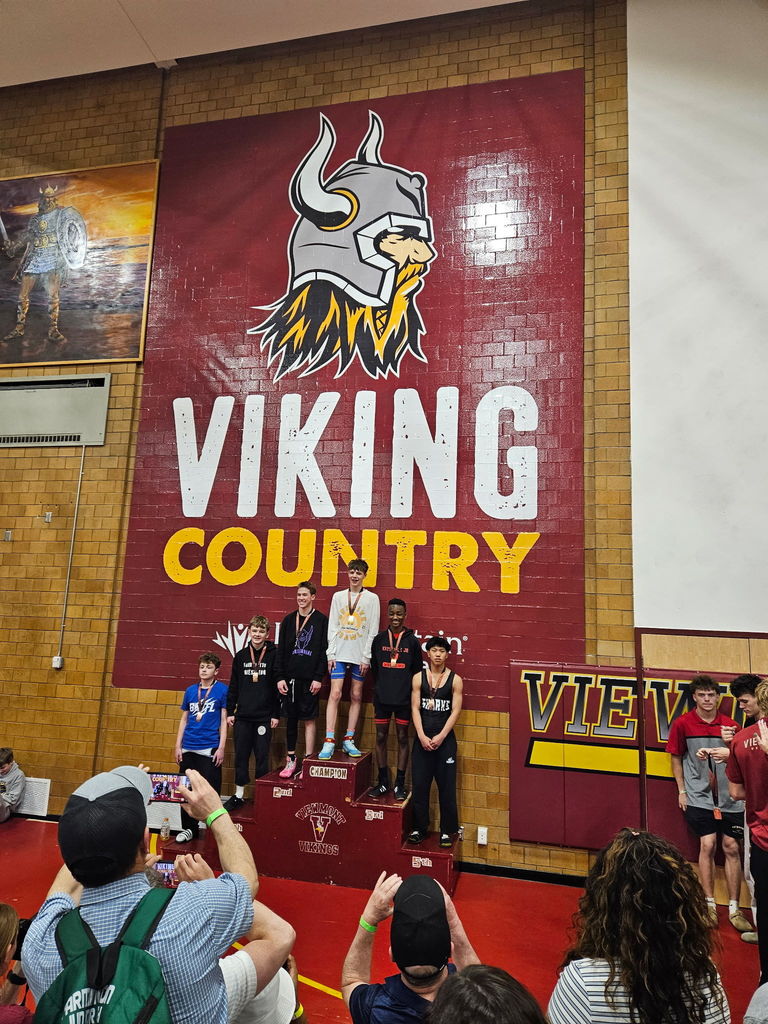 Another round of wrestlers who medaled. 