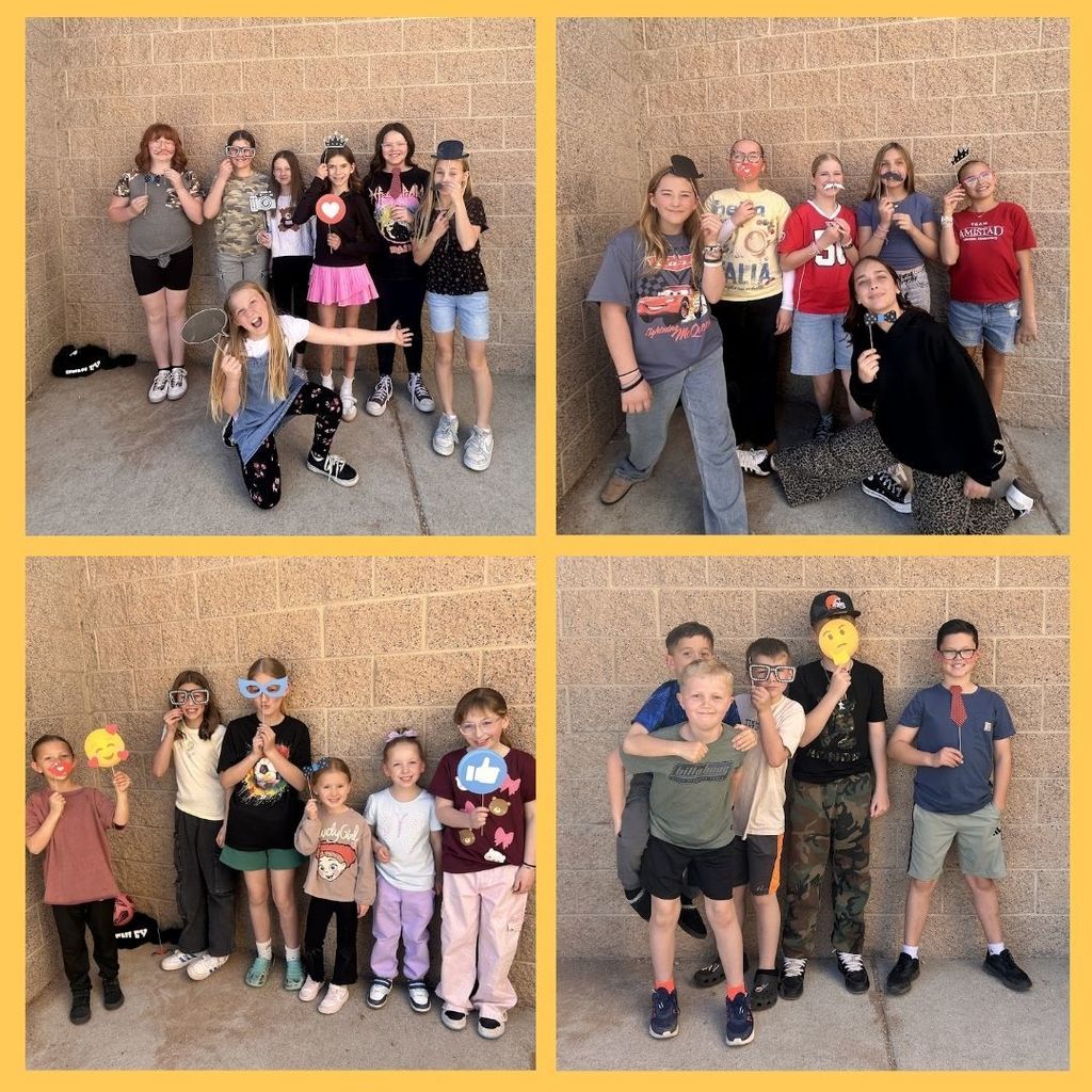 Students pose with fun props out at recess.