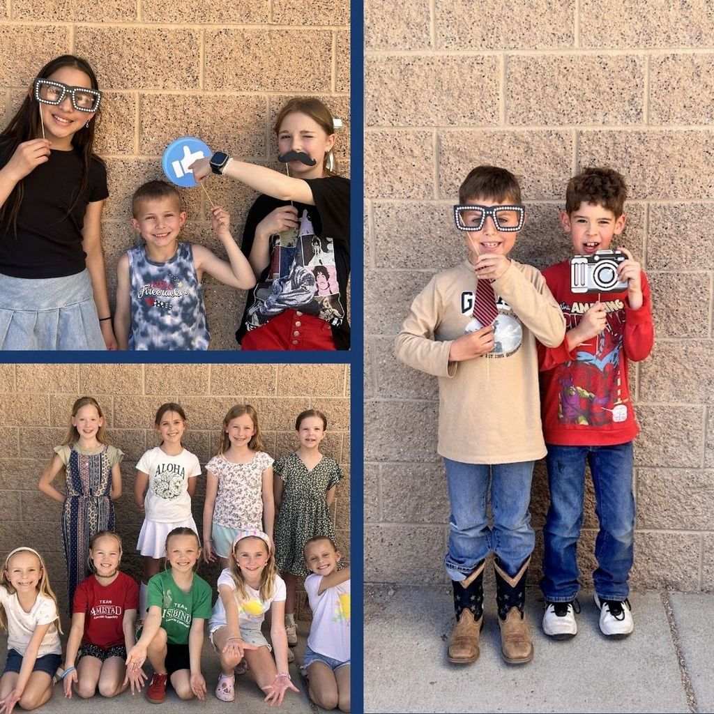 Students pose with fun props out at recess.