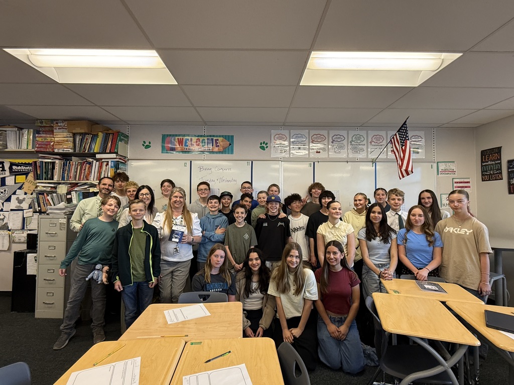 Mrs. Flitton receiving the Best in Davis Award with her students.  