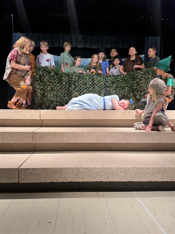 Peter Pan and the lost boys singing "Wendy" to their new mother on the meadowbrook stage