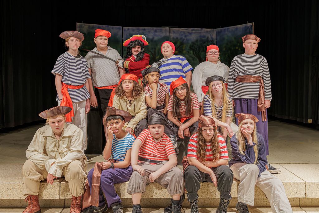 The Pirates of Peter Pan posing on Meadowbrook's stage