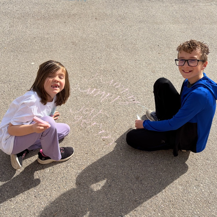 6th grade buddies helping with spelling words! 