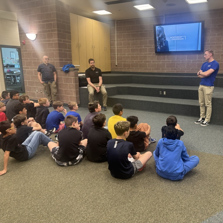 Students listening to presentation