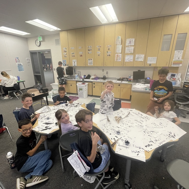 Fifth graders and kindergartners working together