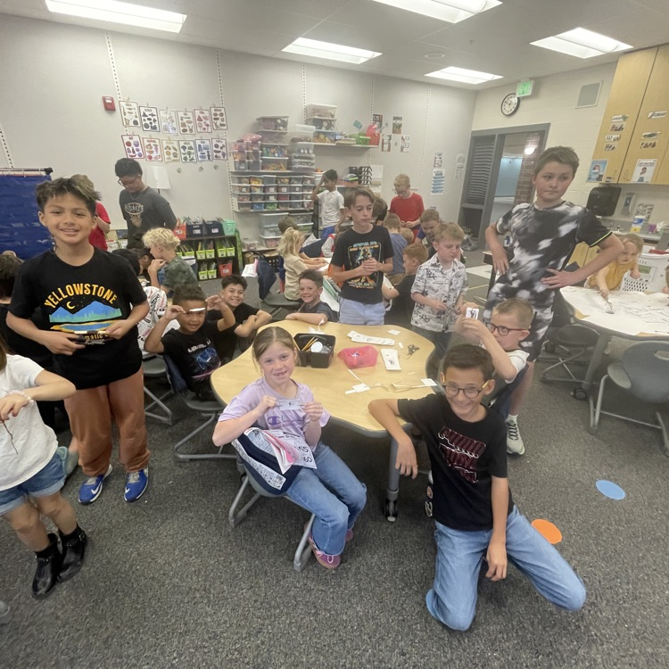 Fifth graders and kindergartners working together