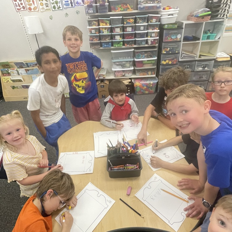 This readers in kindergartners working together