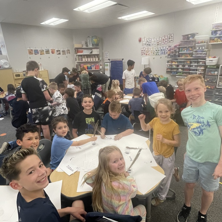 Fifth graders working on project