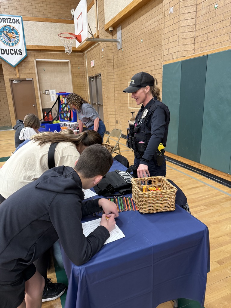 FJH students learning about being a police officer. 