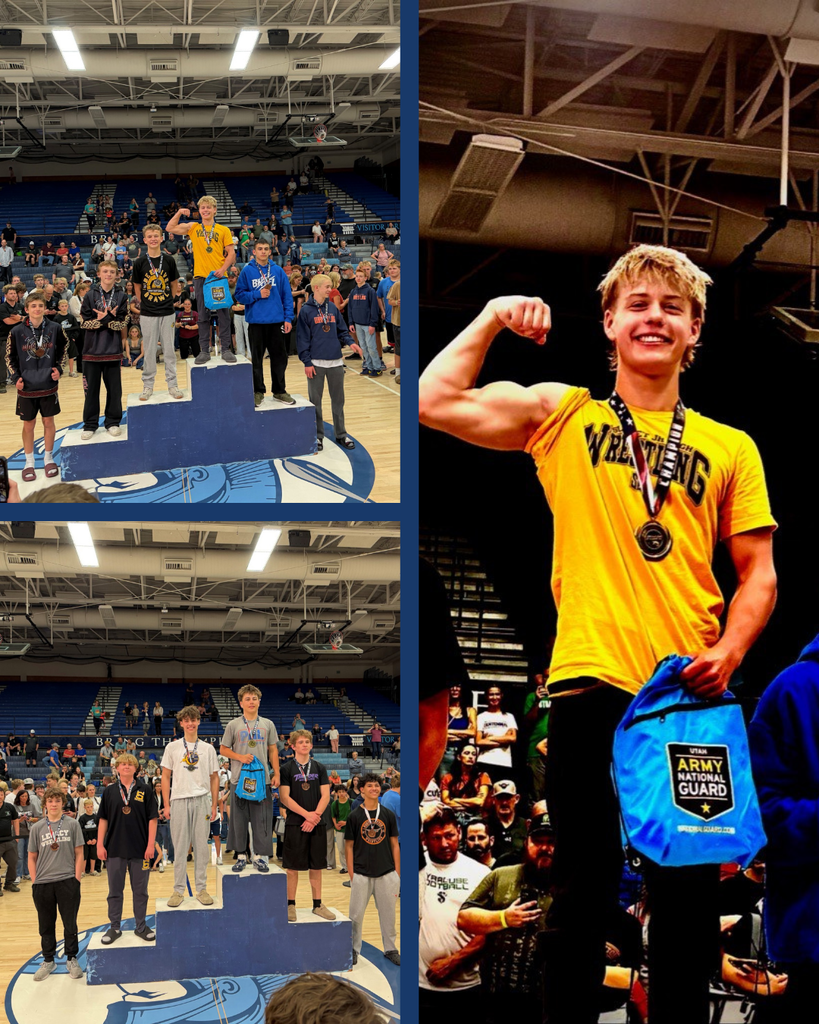 Wresters pose on the podium, and a young man flexes his muscles.