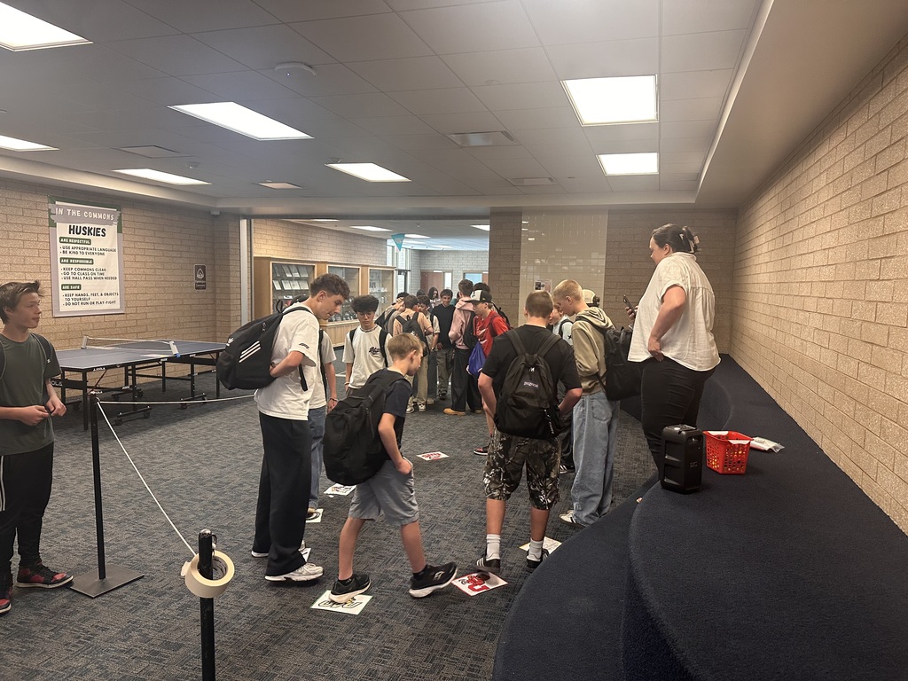 Students participating in a cake walk for college week. 