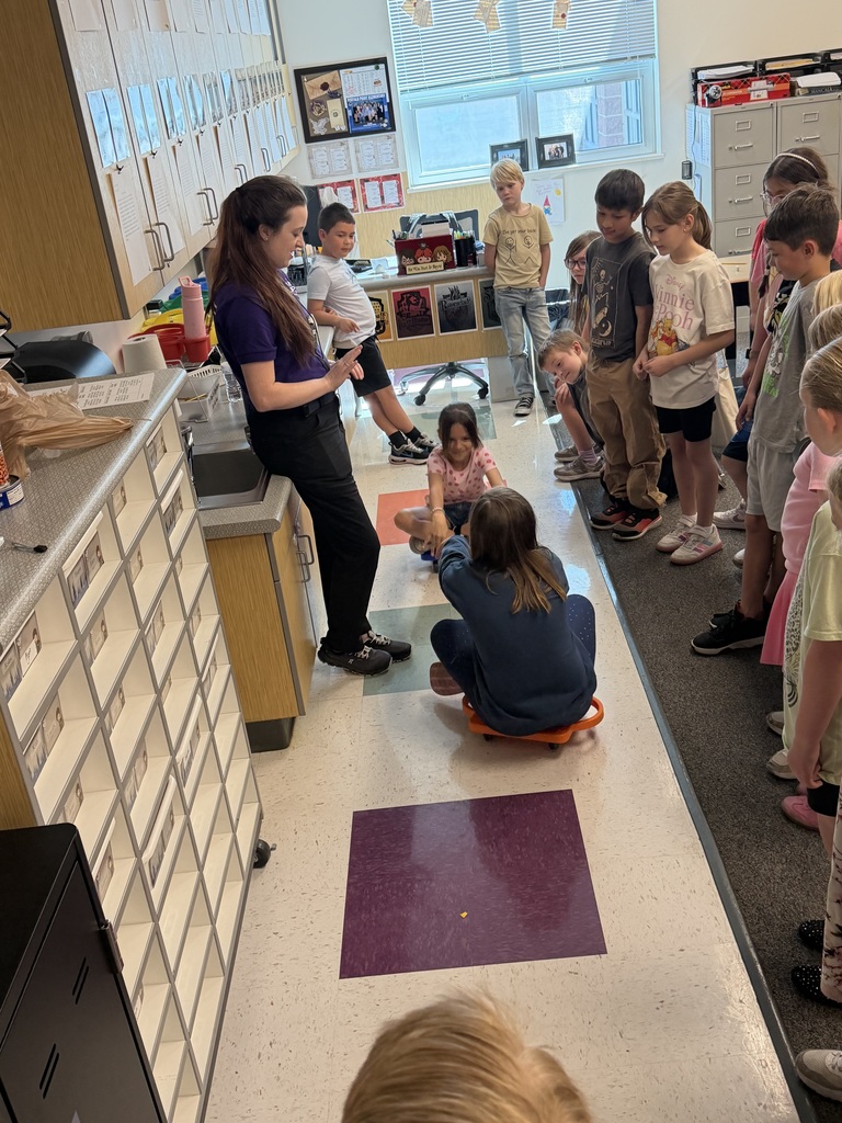 students on scooter boards