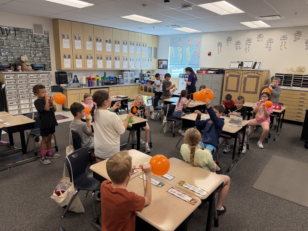students with balloons