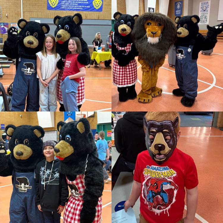 students posing with Black Bear Diner and school mascot