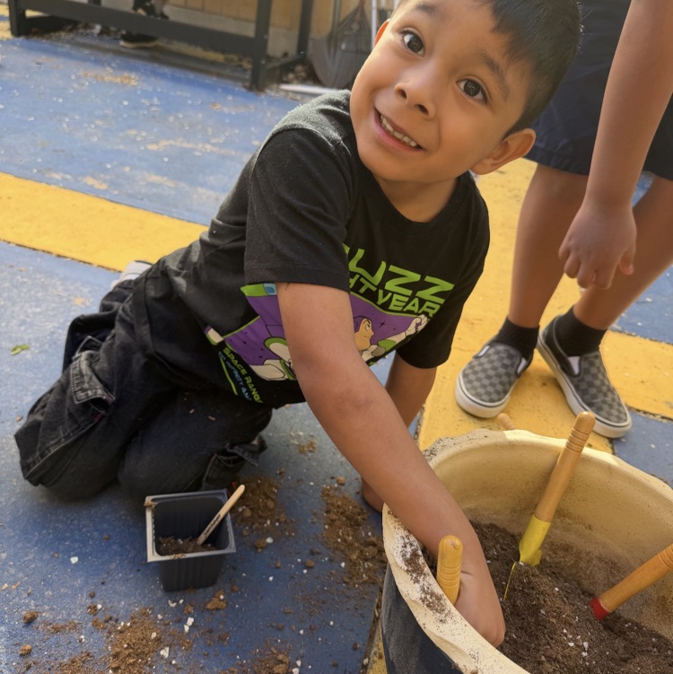 Students in Kindergarten through 2nd grade ASC, learning about planting flowers and growing a garden. 