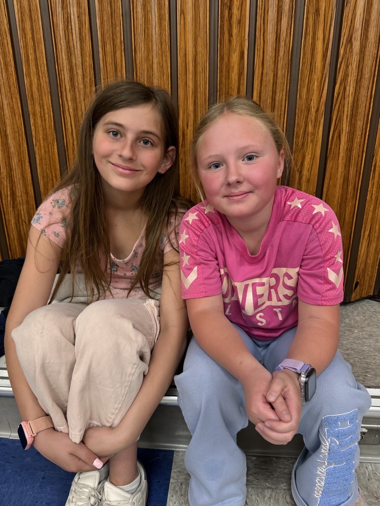 5th graders sitting on a stage