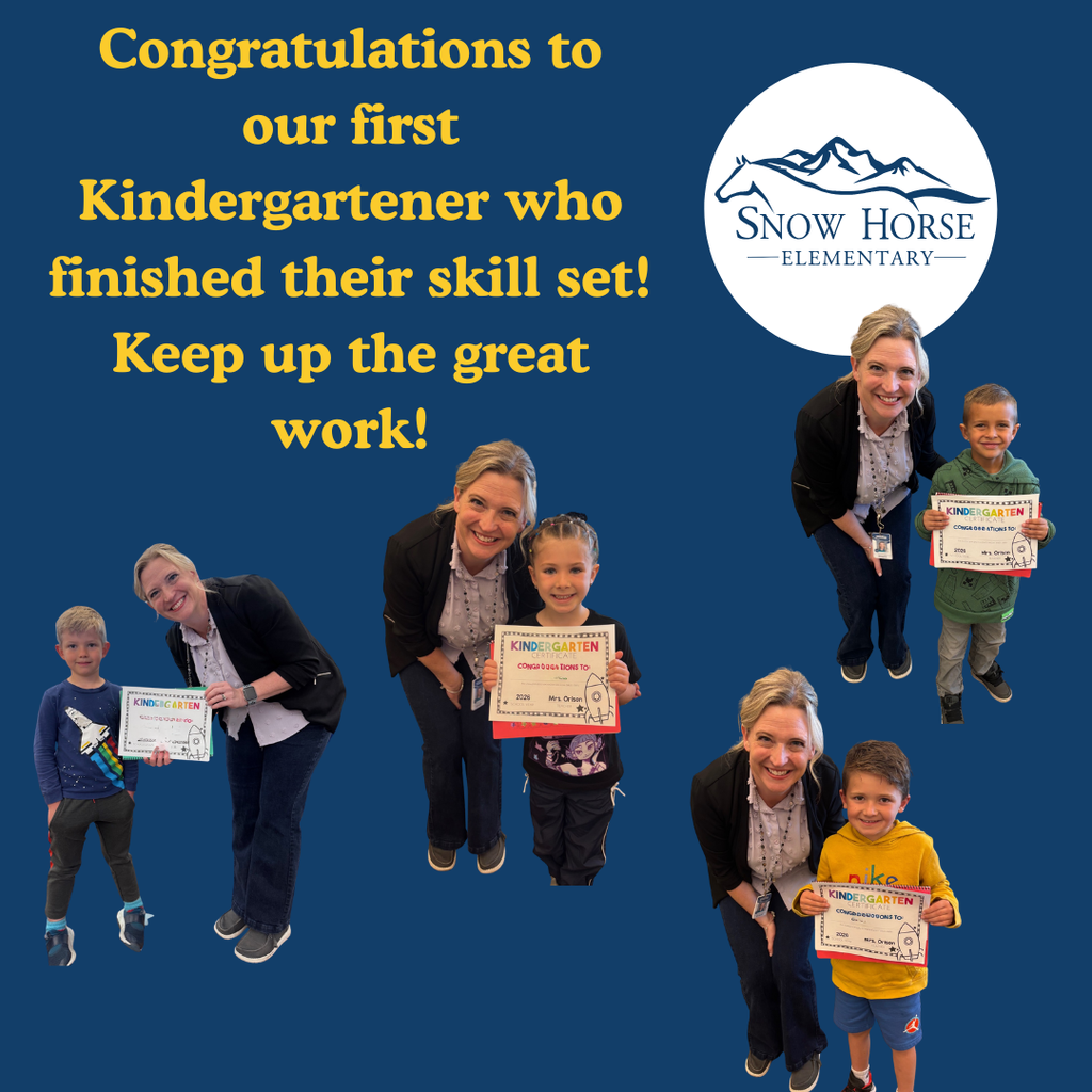 Kindergartners passing off their certificate. 