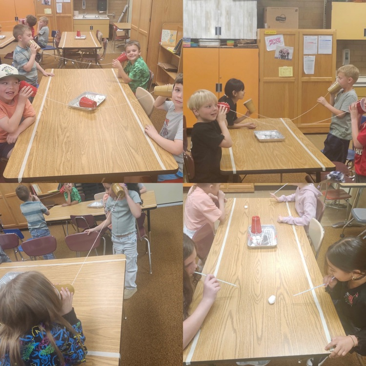 science in action during their stem class - students competing projects 