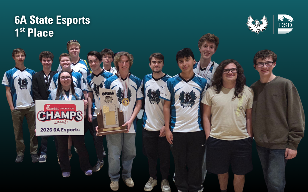 A group of Farmington High students posing with their State trophy. 6A State Esports - 1st Place.