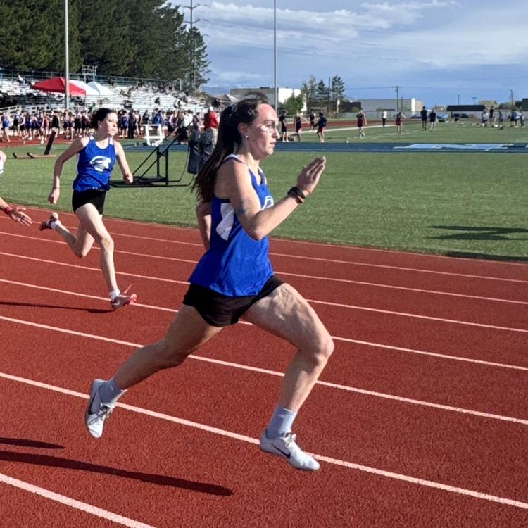 student running track