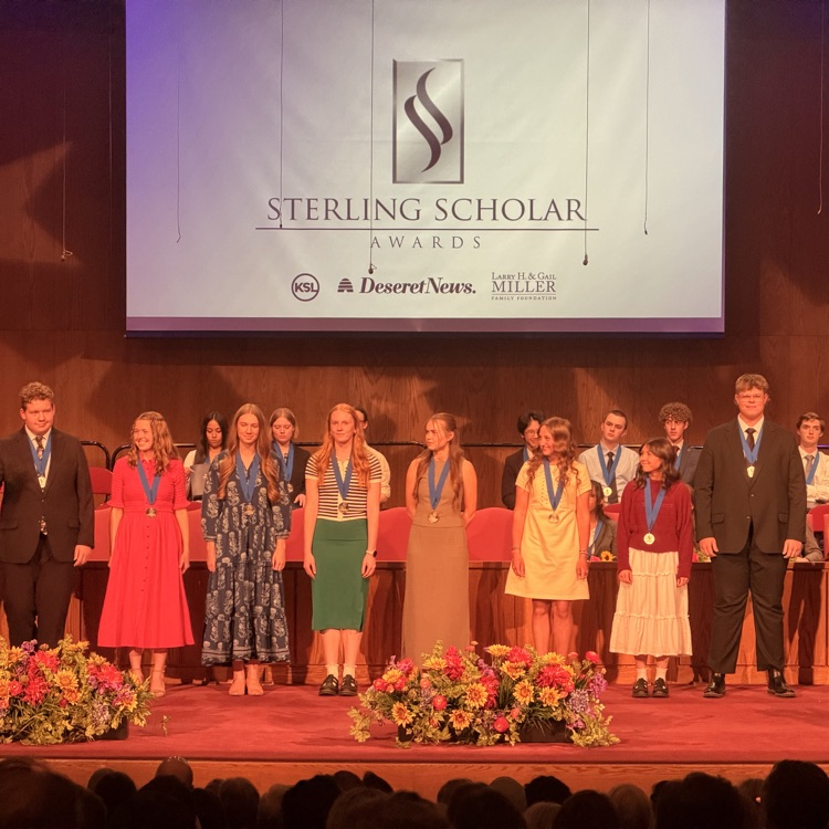 maya on stage with the other finalists