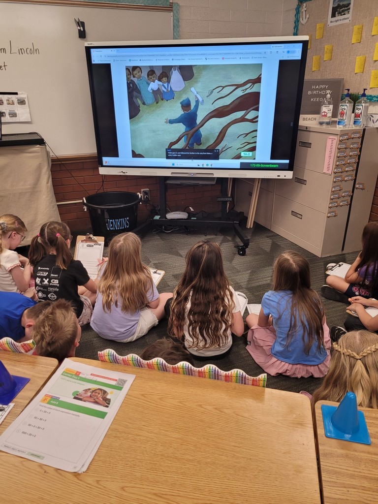Mrs. Jenkins class learning with the smart board