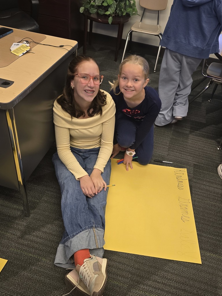 students making hope week poster