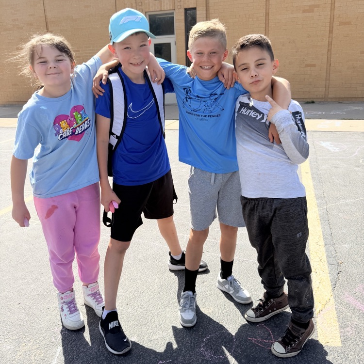 3rd graders enjoying chalk day for an end of year ABC countdown activity 