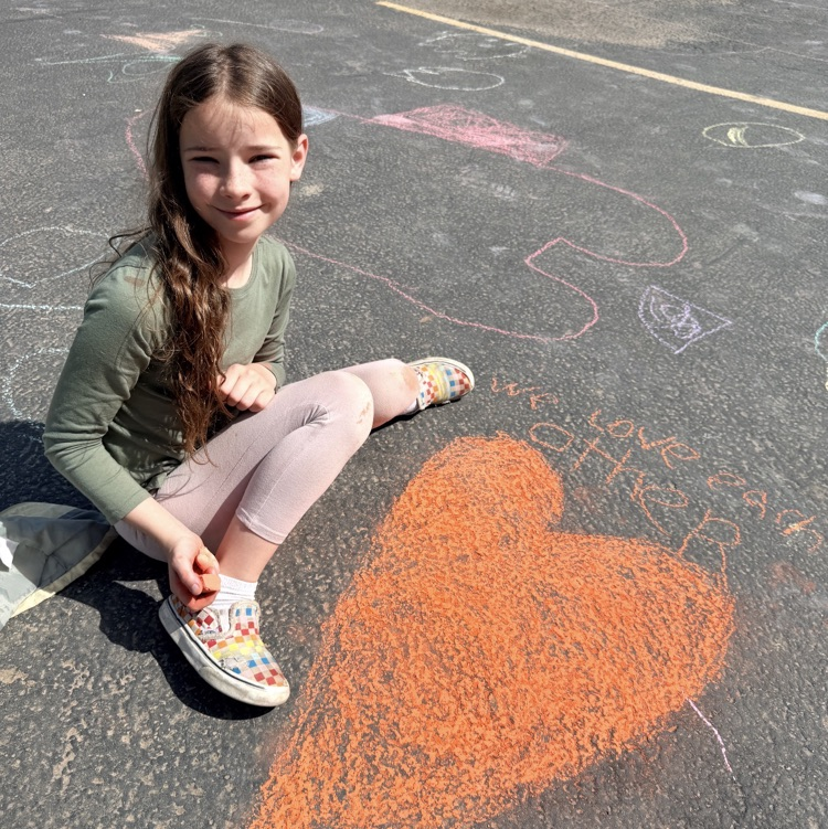3rd graders enjoying chalk day for an end of year ABC countdown activity 