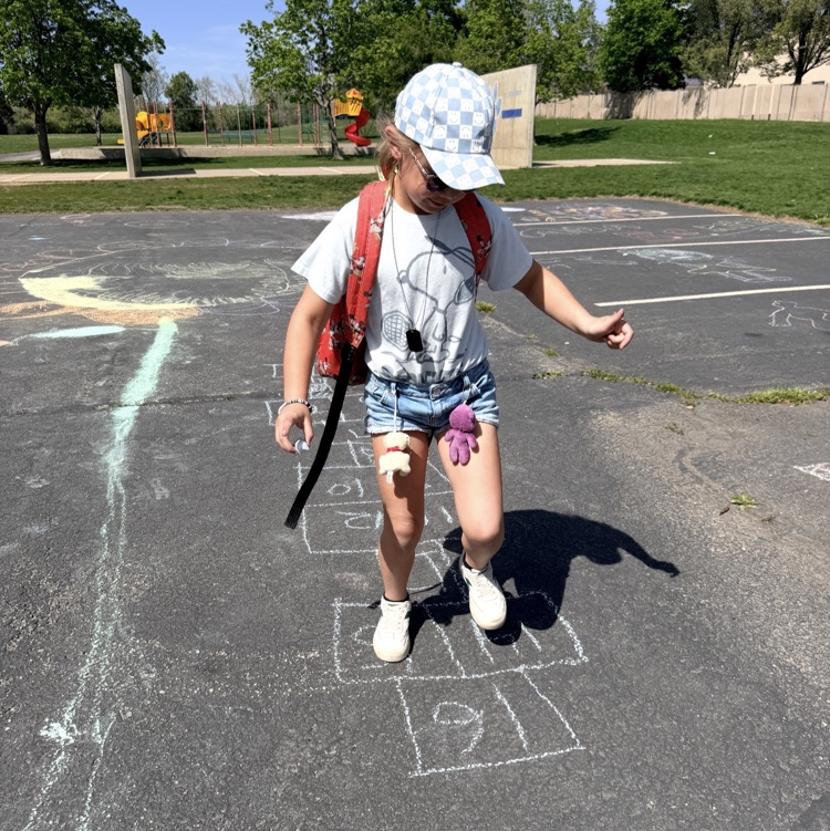 3rd graders enjoying chalk day for an end of year ABC countdown activity 