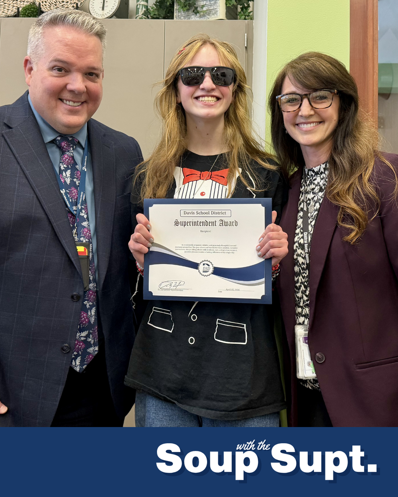 A student smiling with their principal and Dr. Linford, Davis School District Superintendent for Soup with the Supt. 