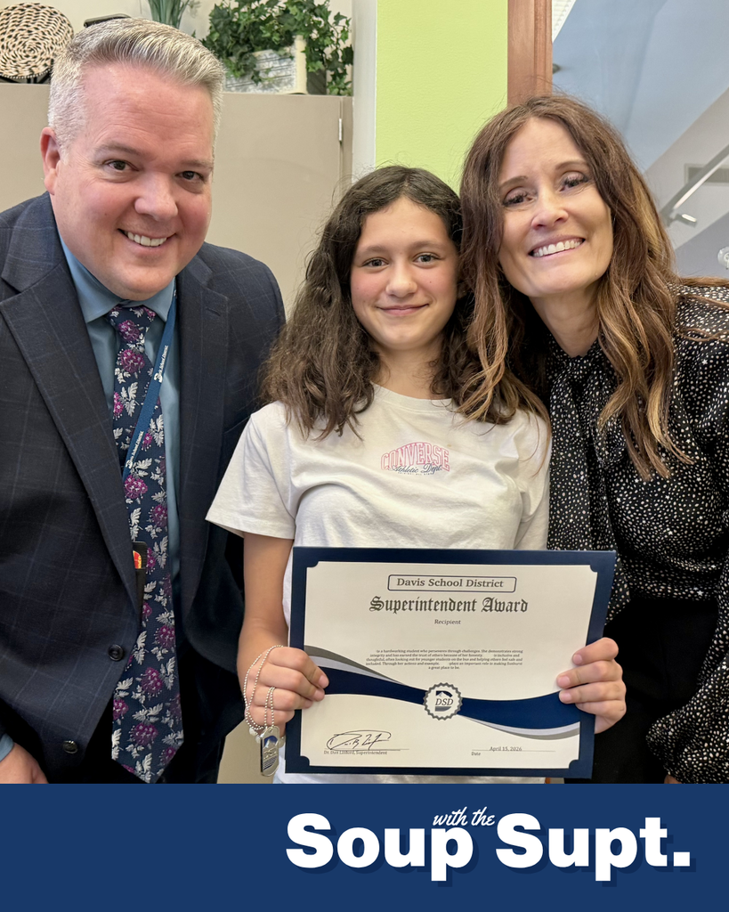 A student smiling with their principal and Dr. Linford, Davis School District Superintendent for Soup with the Supt. 