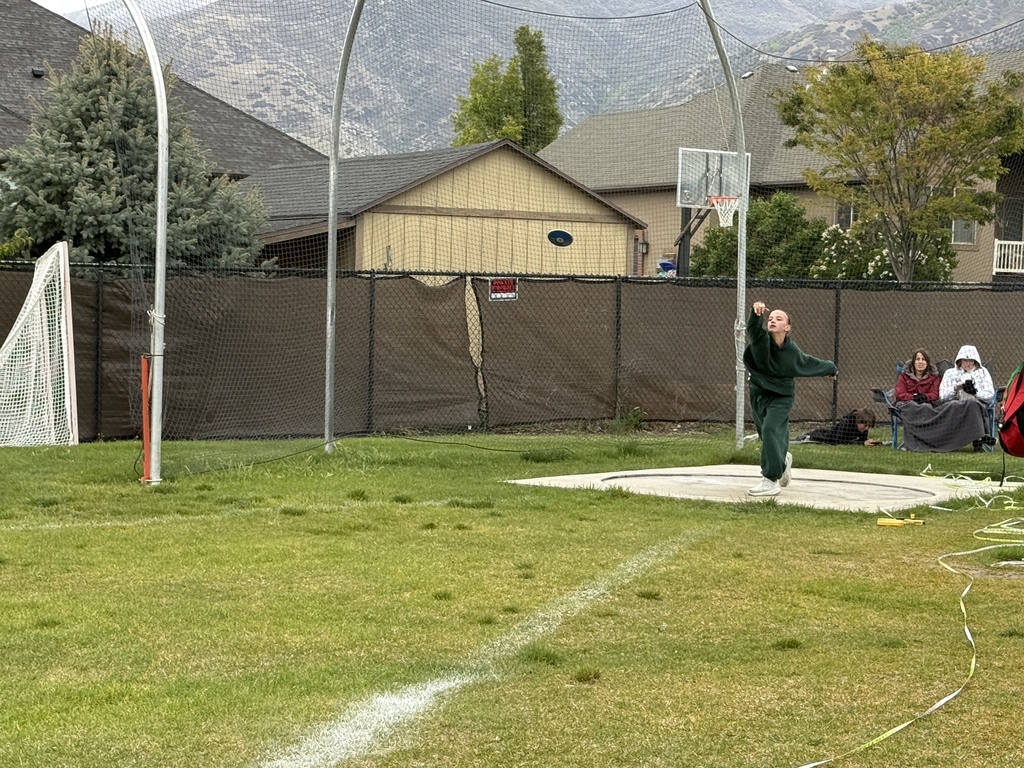 A student doing the discus event. 