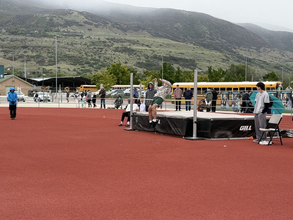 A student doing the high jump. 