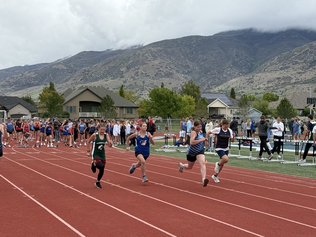 Student running the 100 meter dash. 
