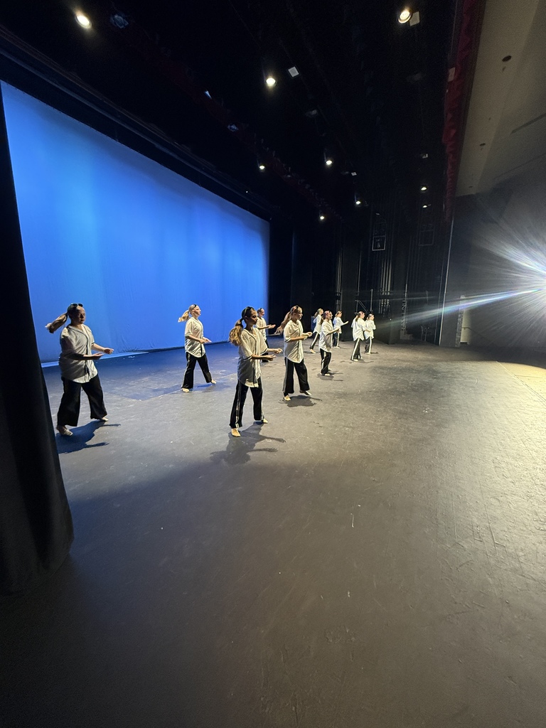 image of girls dancing on the stage