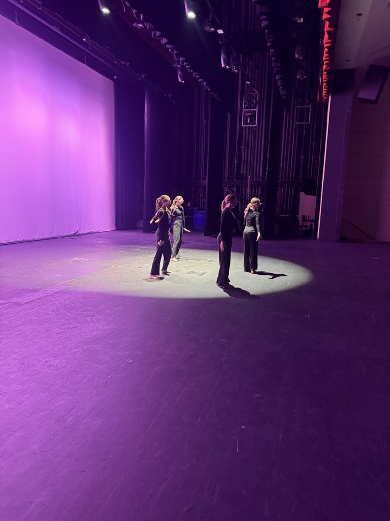image of girls dancing on a stage