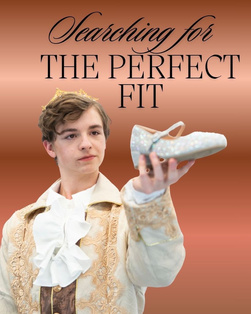 A student dressed up as the prince from Cinderella holding a shoe stating "Searching for the perfect fit."