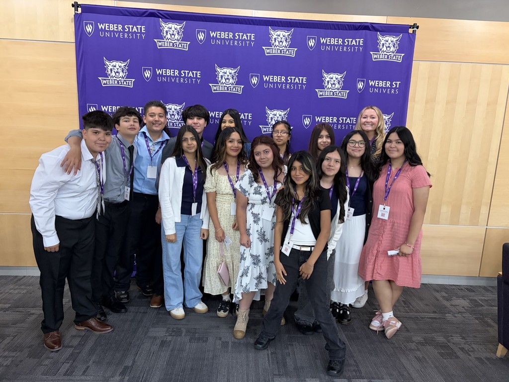 LIA Students Standing Together in Front of a Weber State Background