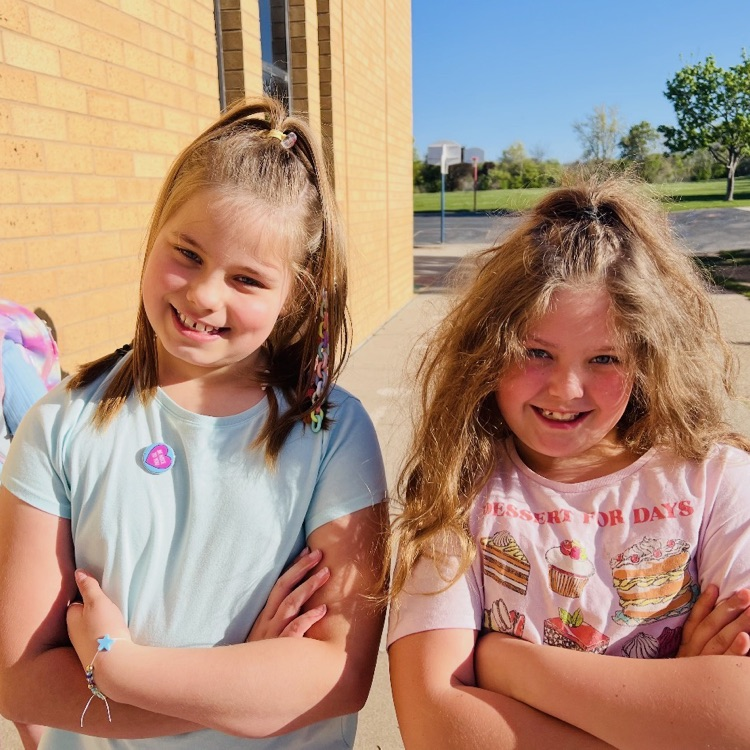 2nd graders showing their crazy hair styles for an ABC countdown end of year activity 