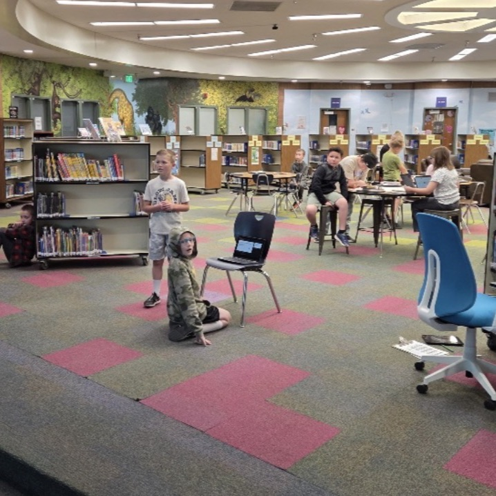 4th graders giving reports during library time 