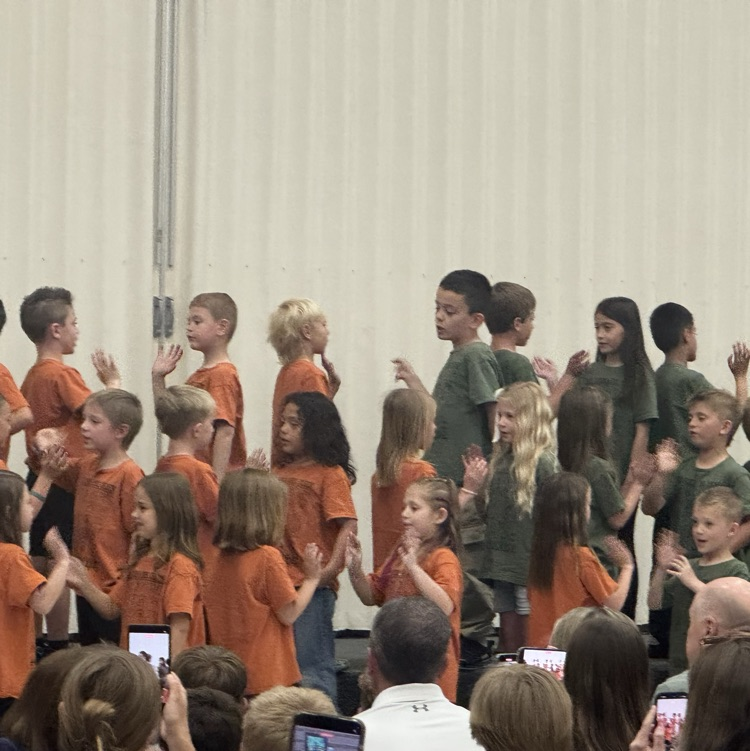 students performing on the steps