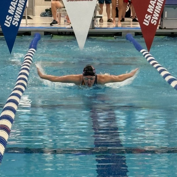 Coach woodbury Swimming in a lane